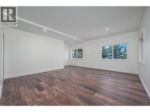 Downstairs rec room at 7936 McLennan Road, North BX, Vernon