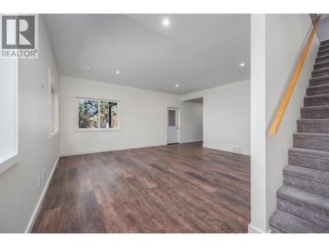 Downstairs rec room at 7936 McLennan Road, North BX, Vernon
