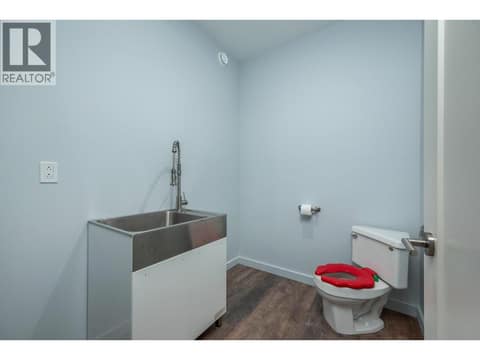 Downstairs wash room at 7936 McLennan Road, North BX, Vernon