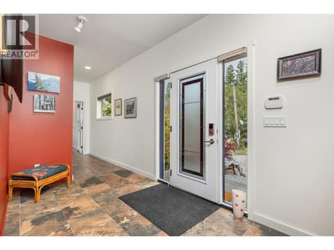 Foyer entrance at 7936 McLennan Road, North BX, Vernon