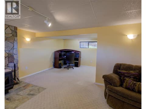 Basement family room to office area or flex space at 5894 Dedecker West Road, North BX, Vernon