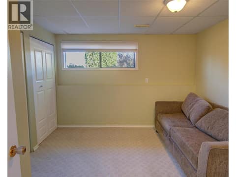 Bedroom on lower level at 5894 Dedecker West Road, North BX, Vernon