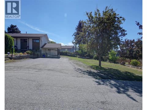 Carport and storage shed behind and lots of parking and yard area at 5894 Dedecker West Road, North BX, Vernon