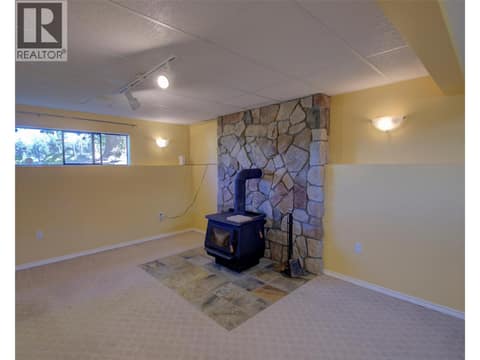 Family room at basement level at 5894 Dedecker West Road, North BX, Vernon