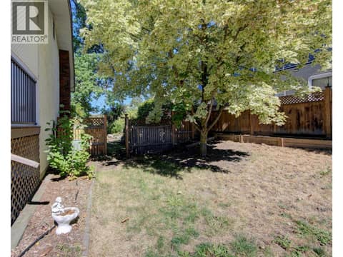Fenced in side yard at 5894 Dedecker West Road, North BX, Vernon