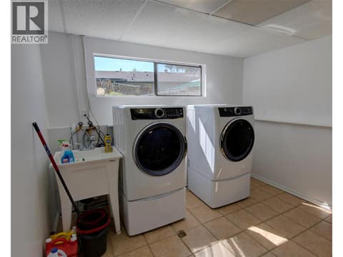 Laundry room on lower level at 5894 Dedecker West Road, North BX, Vernon