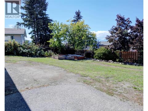 Side yard of home, lots of space for yard area. at 5894 Dedecker West Road, North BX, Vernon