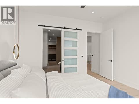Barn door to ensuite at 5584 Upper Mission Court, Kettle Valley, Kelowna