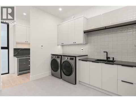 Laundry and garage area at 5584 Upper Mission Court, Kettle Valley, Kelowna