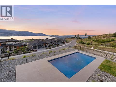 Pool with automatic cover at 5584 Upper Mission Court, Kettle Valley, Kelowna