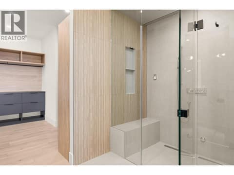 Steam shower with built-in bench at 5584 Upper Mission Court, Kettle Valley, Kelowna