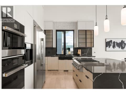 Waterfall edge island at 5584 Upper Mission Court, Kettle Valley, Kelowna