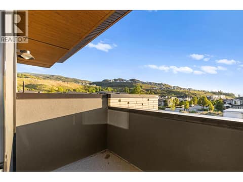 Balcony from upper bedrooms at 4983 Bucktail Lane, Upper Mission, Kelowna