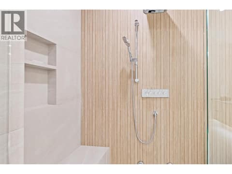 Ensuite with steam shower and soaker tub at 4983 Bucktail Lane, Upper Mission, Kelowna