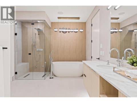 Ensuite with steam shower and soaker tub at 4983 Bucktail Lane, Upper Mission, Kelowna