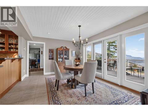 Casual dining room with access to the patio at 1776 Keloka Drive, West Kelowna Estates