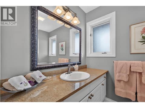 Full bathroom on the main level at 1776 Keloka Drive, West Kelowna Estates