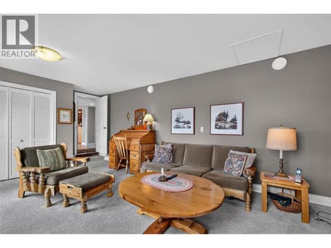 Sitting/TV room on the main level at 1776 Keloka Drive, West Kelowna Estates