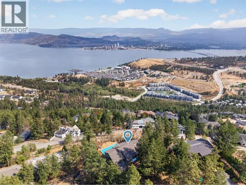 Situated amongst the trees in desirable West Kelowna Estates at 1776 Keloka Drive, West Kelowna Estates