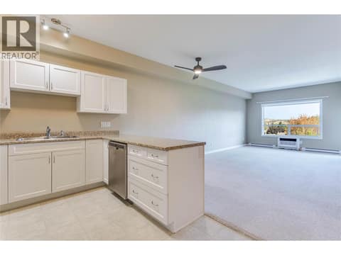 Open-concept layout filled with natural light at 770 Rutland Road N Unit# 401, Rutland North, Kelowna