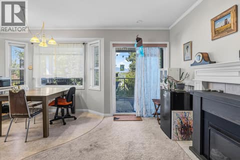 Dining Room and Family Room with access to the Balcony at 6100 Old Vernon Road Unit# 30, Ellison, Kelowna