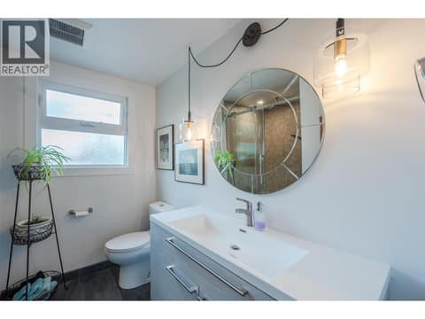 Downstairs 3pc common bathroom. at 127 Elm Avenue, Main South, Penticton