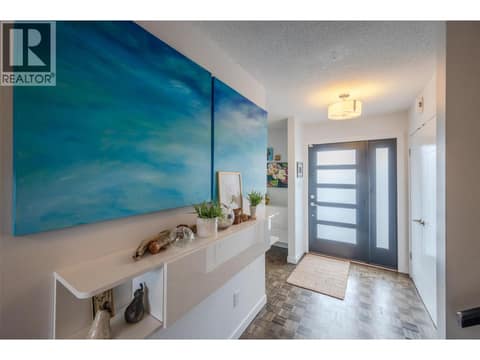 Main floor foyer. at 127 Elm Avenue, Main South, Penticton