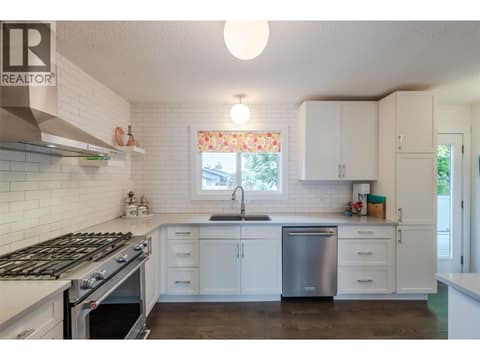 Main floor kitchen. at 127 Elm Avenue, Main South, Penticton
