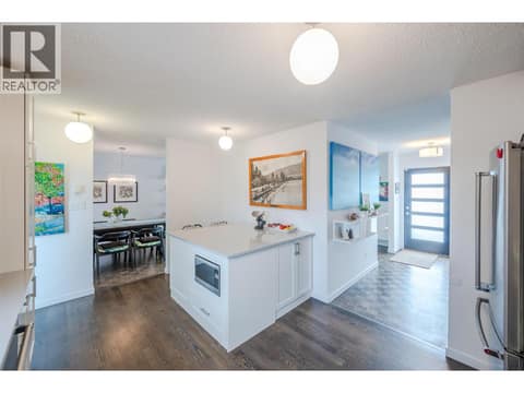 Main floor kitchen. at 127 Elm Avenue, Main South, Penticton