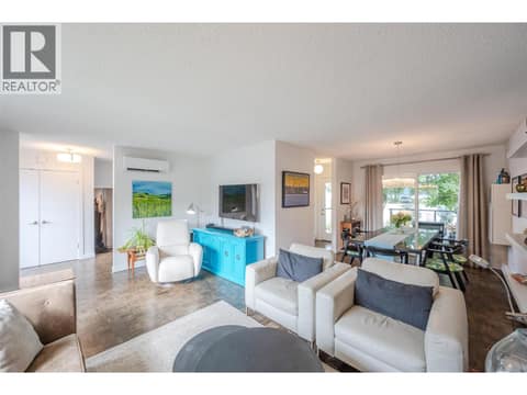 Main floor living room. at 127 Elm Avenue, Main South, Penticton