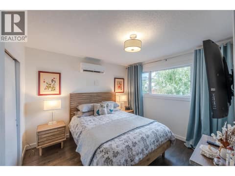 Primary downstairs bedroom. at 127 Elm Avenue, Main South, Penticton