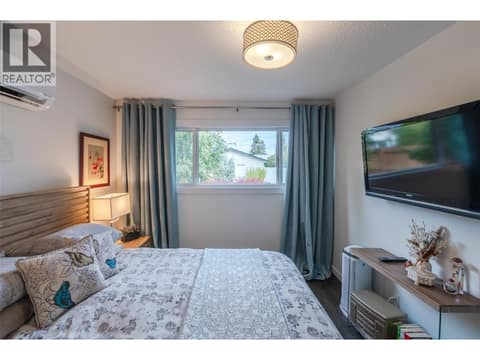 Primary downstairs bedroom. at 127 Elm Avenue, Main South, Penticton