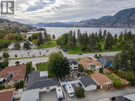Skaha Lake & Park across the street and shows back lane access. at 127 Elm Avenue, Main South, Penticton