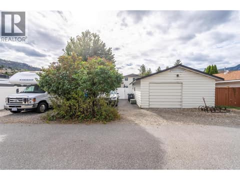 Workshop/garage along additional back lane parking (up to 3 open parking spaces). at 127 Elm Avenue, Main South, Penticton