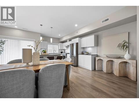A flexible dining space easily accommodates a large table for gatherings. at 255 Taylor Road Unit# 18, Rutland South, Kelowna
