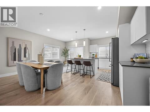 Bright, spacious layout connects the kitchen, dining and living areas. at 255 Taylor Road Unit# 18, Rutland South, Kelowna