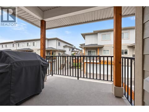 Covered patio extends the living space outdoors, complete with a gas connection for your BBQ or fire table. at 255 Taylor Road Unit# 18, Rutland South, Kelowna