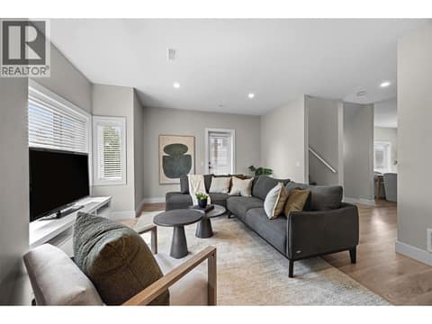 Generous proportions easily accommodate a large sectional and additional seating. at 255 Taylor Road Unit# 18, Rutland South, Kelowna