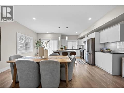 High ceilings and wide-plank flooring enhance the open, airy feel. at 255 Taylor Road Unit# 18, Rutland South, Kelowna
