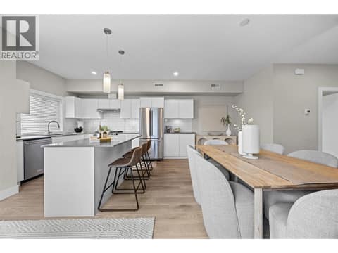Spacious dining area easily accommodates a full-size table while remaining open to the kitchen. at 255 Taylor Road Unit# 18, Rutland South, Kelowna