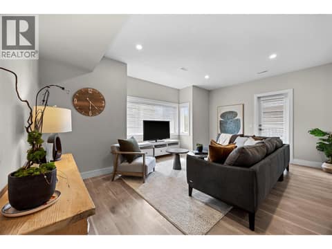 Spacious, light-filled living room with plenty of room to relax and unwind. at 255 Taylor Road Unit# 18, Rutland South, Kelowna