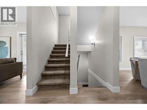 Thoughtfully designed three-level layout keeps living and sleeping spaces nicely separated. at 255 Taylor Road Unit# 18, Rutland South, Kelowna