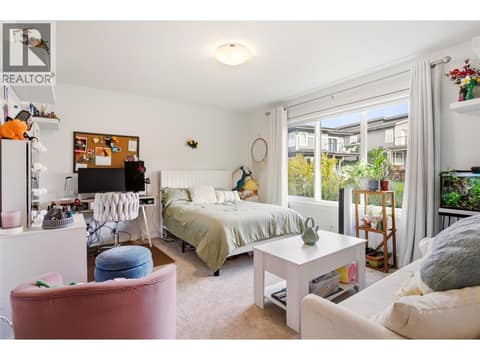 3rd bedroom with spacious walk-in closet.  Upper level at 1215 Ponds Avenue, Upper Mission, Kelowna