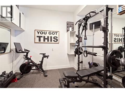 Gym setup in garage at 1215 Ponds Avenue, Upper Mission, Kelowna