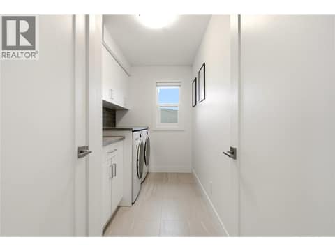 Laundry room- Upper level at 1215 Ponds Avenue, Upper Mission, Kelowna