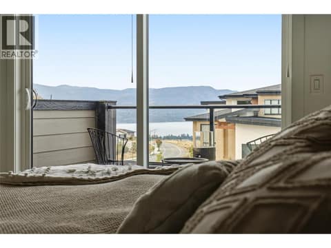 Primary bedroom- lake view at 1215 Ponds Avenue, Upper Mission, Kelowna