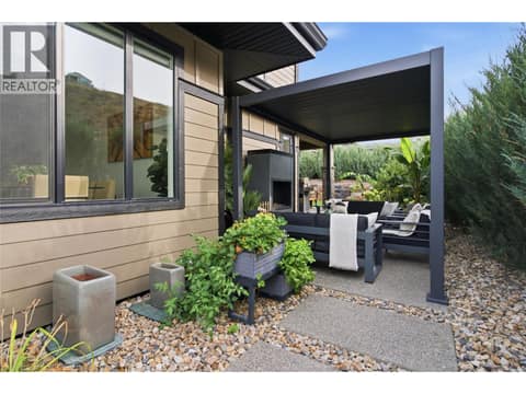 Side patio- right side of home at 1215 Ponds Avenue, Upper Mission, Kelowna