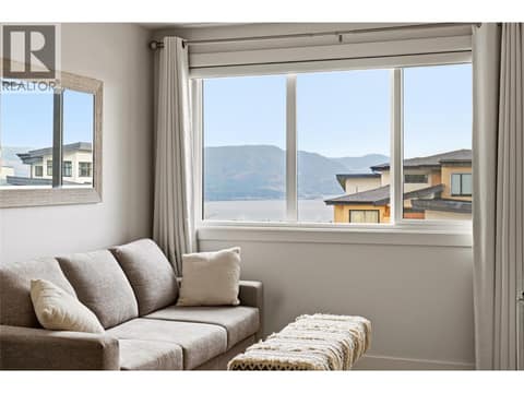 Upper landing- TV room with lake view at 1215 Ponds Avenue, Upper Mission, Kelowna