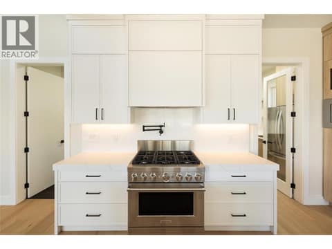 6 Burner Gas Range with Pot-Filler and Quartz backsplash at 979 Loseth Drive, Black Mountain, Kelowna