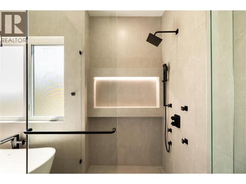Fully tiled with lit shelving at 979 Loseth Drive, Black Mountain, Kelowna